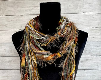 Womens unique, versatile, lightweight boho  scarf in shades of brown, green, orange, tan, cream, taupe and burgundy.