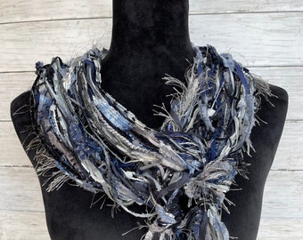 Womens scarf, fun, versatile, lightweight fashion scarf in shades of blue, silver, grey, black and white.