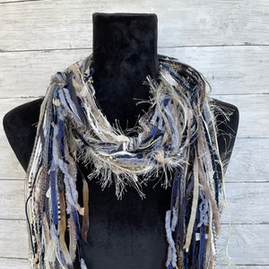 Womens scarf, fun, versatile, lightweight fashion scarf in shades of navy blue, tan, gray, white, cream and taupe.