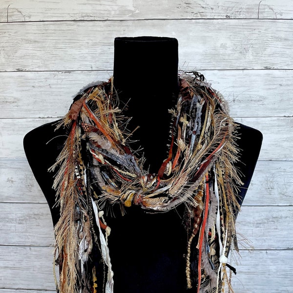 Womens unique, versatile, lightweight boho  scarf in shades of copper, brown, tan, cream, black and taupe.