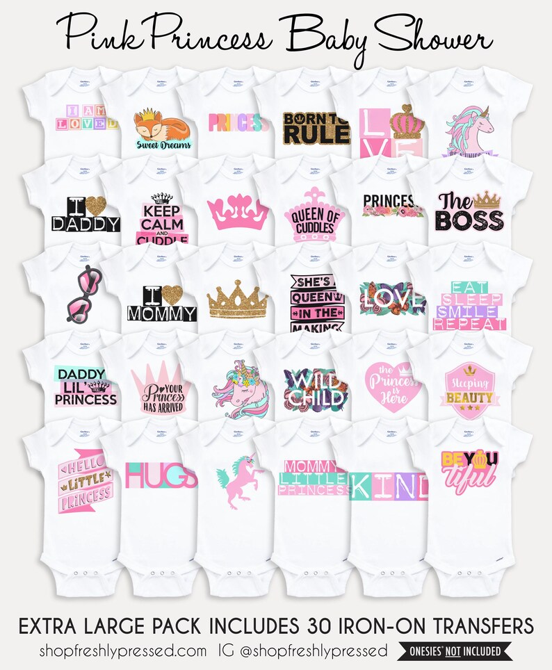 May include: A collection of thirty white baby bodysuits featuring various pink, gold, and multi-colored graphic designs with text including Pink Princess Baby Shower, I Am Loved, Born To Rule, Queen Of Cuddles, The Boss, and Sleeping Beauty.