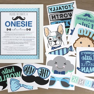 May include: A set of iron-on decals for a baby onesie. The decals feature a variety of designs, including a mustache, a bow tie, a cloud, a dog, and the words "Hello World", "The Man", "Little Gentleman", and "Stud".