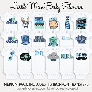 May include: A set of 18 iron-on transfers for baby onesies. The transfers feature various designs and sayings, including "I love mommy", "I love daddy", "Mommy's little gentle man", "I am loved", "Handsome little dude", "Totally worth the wait", "Baby of the year", "Hello world", "Kind", "The man", and more. The transfers are in blue, green, and white.