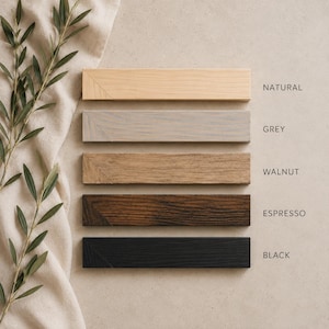 May include: Five rectangular wooden frame strips arranged vertically, featuring distinct finishes labelled as Natural, Grey, Walnut, Espresso, and Black. Each strip displays a visible wood grain texture and a mitered corner detail on the left side.