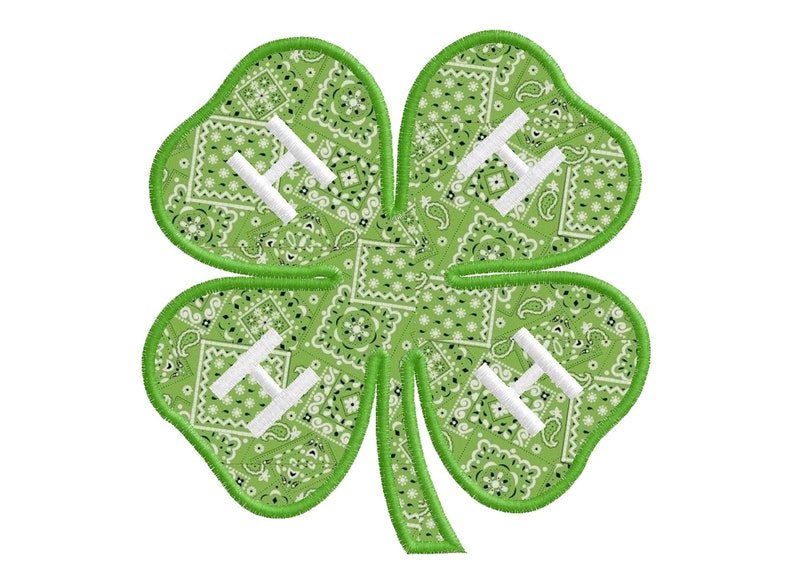 May include: Green four-leaf clover with a white "H" in each leaf. The clover is made of a green fabric with a paisley pattern.