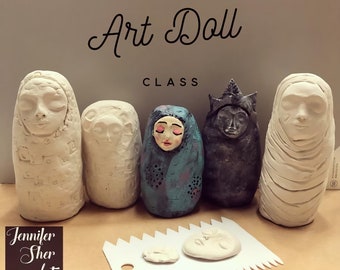 May include: A class on making paper clay art dolls. Five dolls are lined up on a table, each with a unique design. The dolls are made of white paper clay and have different facial expressions and hairstyles. The dolls are all about 6 inches tall. The table is covered in brown paper. There is a white plastic tool with a serrated edge on the table.