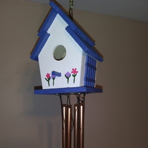 White and Blue Birdhouse with Chimes