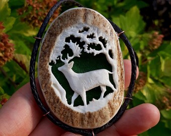 Double-sided hand-carved bolo tie with a fallow deer and a capercaillie