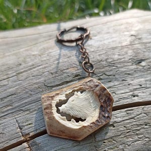 A hand-carved wild boar keychain/necklace - a special gift for a pig hunter!