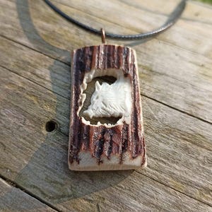 A hand-carved wild boar keychain/necklace - a special gift for a pig hunter!