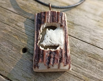 A hand-carved wild boar keychain/necklace - a special gift for a pig hunter!