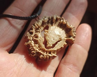 A hand-carved wild boar necklace or a keychain - a special gift for a pig hunter!