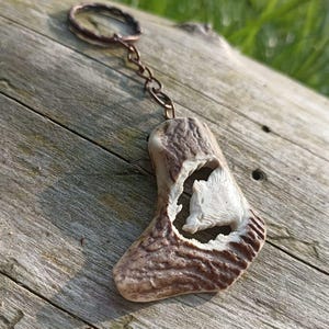 A hand-carved wild boar keychain/necklace - a special gift for a pig hunter!