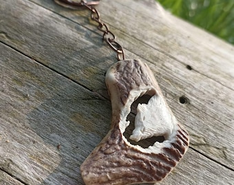 A hand-carved wild boar keychain/necklace - a special gift for a pig hunter!