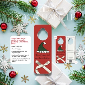 May include: Red door hanger with a white bow and the text "Don't come in! Santa is busy..." The hanger is 4 inches by 11 inches and is made in the USA.