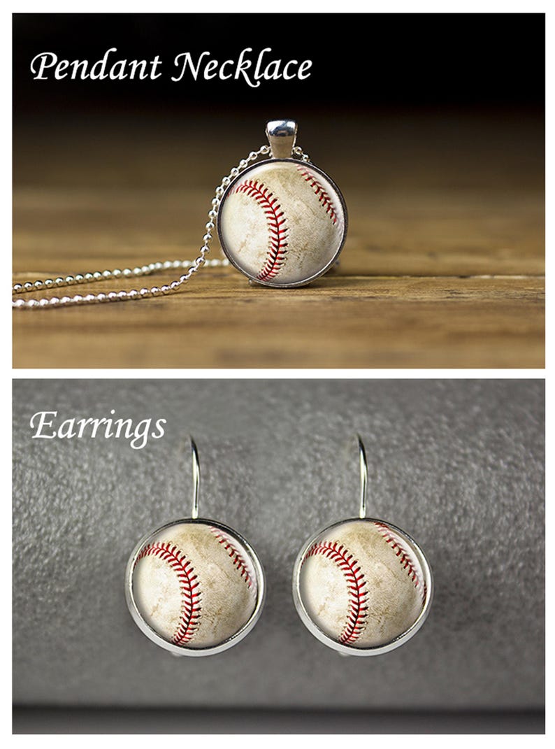 May include: A pendant necklace and earrings featuring a baseball design. The necklace has a silver chain and a round pendant with a baseball image. The earrings are also round with a baseball image and silver hooks. The text "Pendant Necklace" and "Earrings" are visible.
