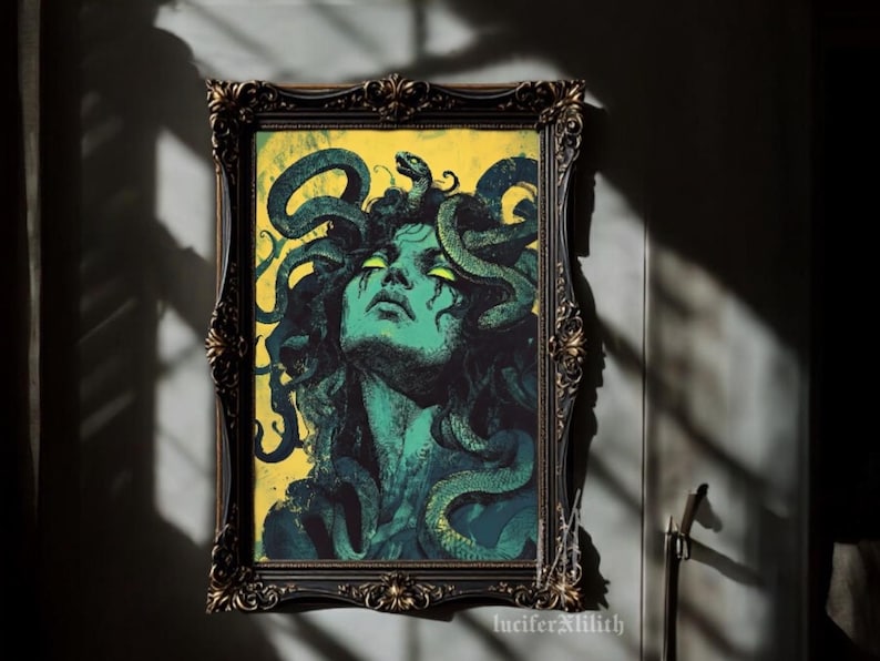 May include: A framed illustration of Medusa, a mythical Greek figure with snakes for hair, depicted with a green face and yellow eyes. The background is a yellow-green colour.