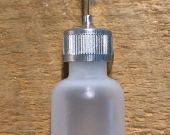 Frasco de cola com ponta de agulha