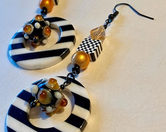 Bold orange black and white earrings. Unique long dangle earring.Art glass.Creative Fall jewelry.October birthday gift.Fun Halloween earring
