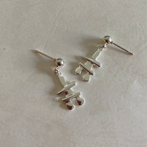 Small Inukshuk earrings. Silver stud earring.Inuit Canada symbol.Minimalist style jewelry. Friend,partner,family member,winter birthday gift