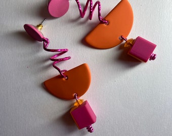 Colorful earrings. Hot pink studs. Bright orange jewelry. Fun long dangle earrings. Curly corkscrew spirals. Terrazzo inspired Woman's gift