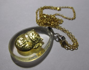 Yellow Gold Foil Maneki Neko Floating in Acrylic Teardrop Pendant with Gold Tone Chain, 18"