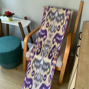 Handgeweven katoenen ikatstof: beige tribale print, paars multi