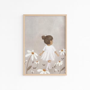 May include: A framed art print featuring a young girl in a white dress and socks, walking through a field of large white daisies. The artwork has a soft, muted color palette with a light brown frame, suitable for a nursery or children's room.