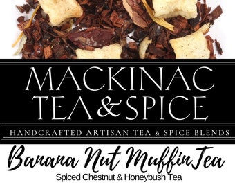 May include: A close-up of a loose leaf tea blend called "Banana Nut Muffin Tea" by Mackinac Tea & Spice. The tea blend is a mix of brown, orange, and white pieces. The tea is handcrafted and made with spiced chestnut and honeybush tea.