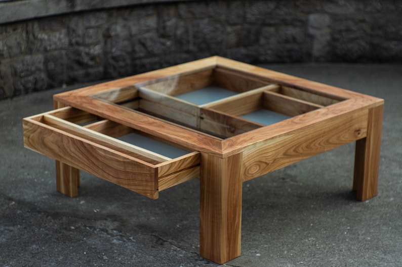 Glass and wood coffee table with drawers and hidden compartments image 3