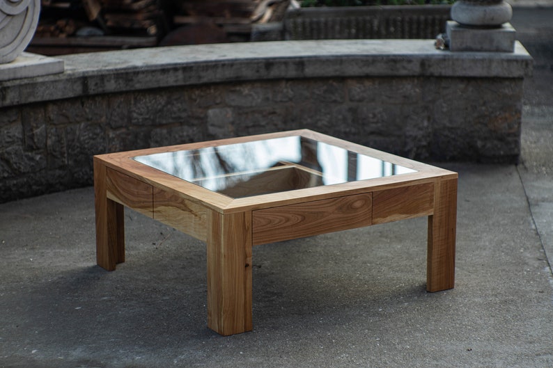 Glass and wood coffee table with drawers and hidden compartments image 10