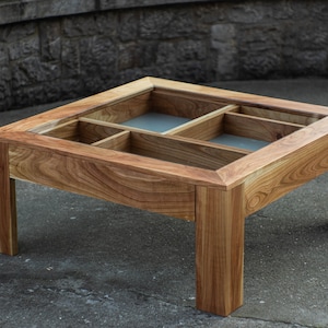 Glass and wood coffee table with drawers and hidden compartments image 7