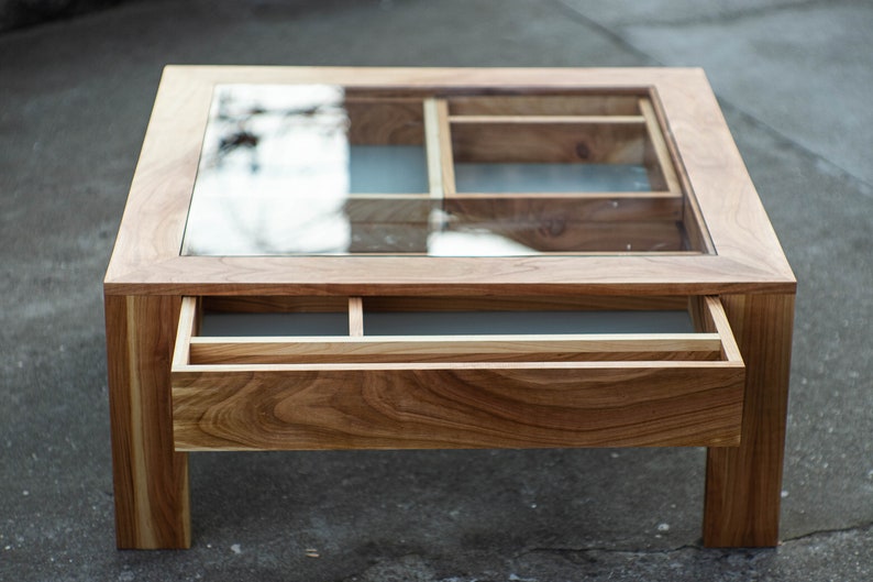 Glass and wood coffee table with drawers and hidden compartments image 6