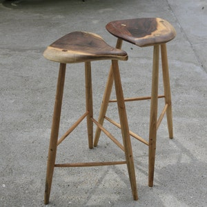 Walnut bar stools inspired by Esherick