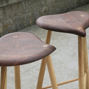Canadian walnut bar stools inspired by Esherick