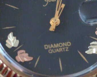 Reloj de pulsera Lucien Piccard Dufonte Black Hills Gold que funciona y mantiene la hora