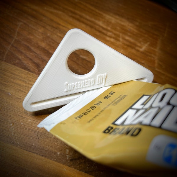 Exprimidor de tubos simple / exprimidor de pasta de dientes para sacar hasta el último trocito del extremo de su tubo.