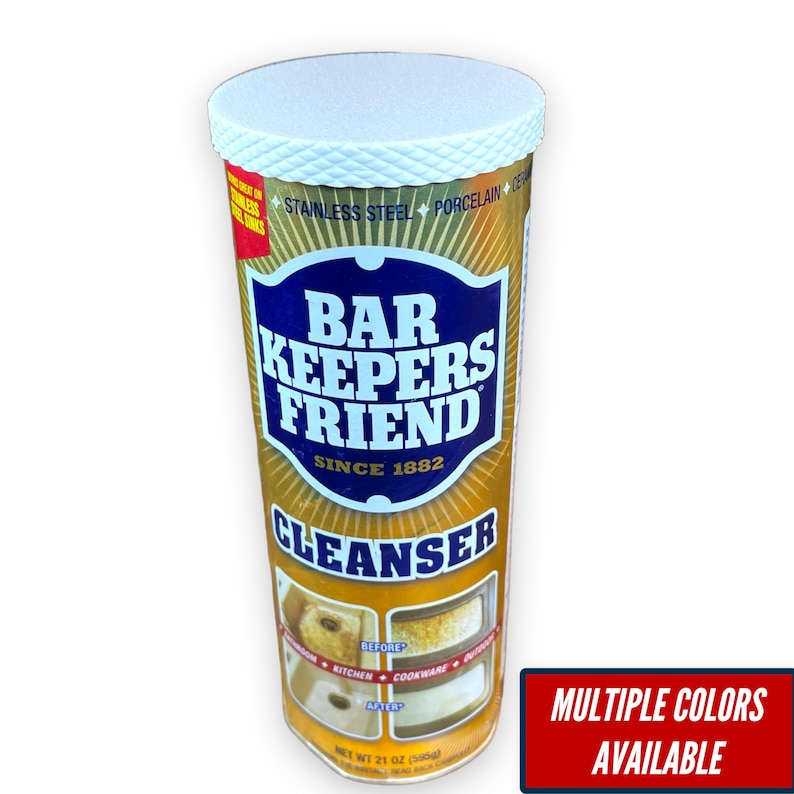 May include: A yellow and blue Bar Keepers Friend Cleanser container with a white lid. The container has a before and after image of a sink. The text on the container reads "Bar Keepers Friend Cleanser Since 1882".