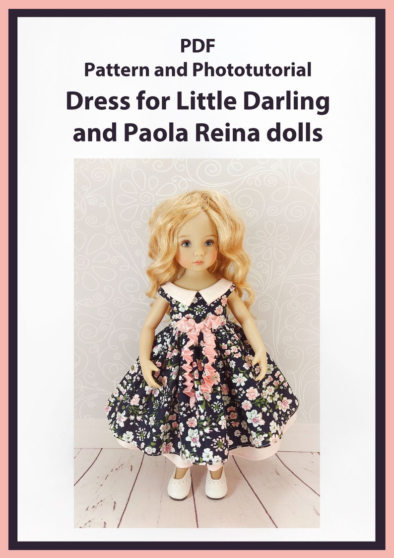 May include: PDF pattern and photo tutorial for a dress for Little Darling and Paola Reina dolls. The dress is black with white and pink floral print and a pink ribbon and ruffle detail. A doll wearing the dress is shown in the image.