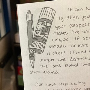 May include: A hand-drawn illustration of a glue stick and a pen. The glue stick is labeled "GLU" and has a white cap. The text reads "It can be easily align your perspective makes the whole unique. If something smaller or more is okay! I found this and started letting it stick around. Our next step is a big one-ink! I use micron pens (which holds up to a"