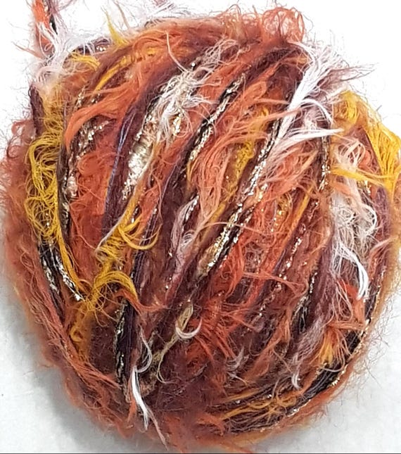 Wool, designer yarn mix, accent yarn/soft novelty yarn/orange tones, description, various fiber types, hand-wound, vintage wool
