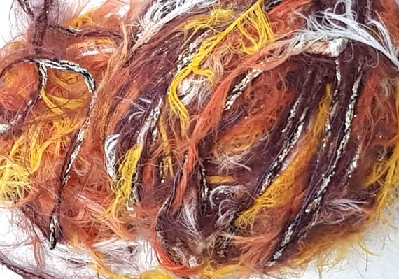 Wool, designer yarn mix, accent yarn/soft novelty yarn/orange tones, description, various fiber types, hand-wound, vintage wool