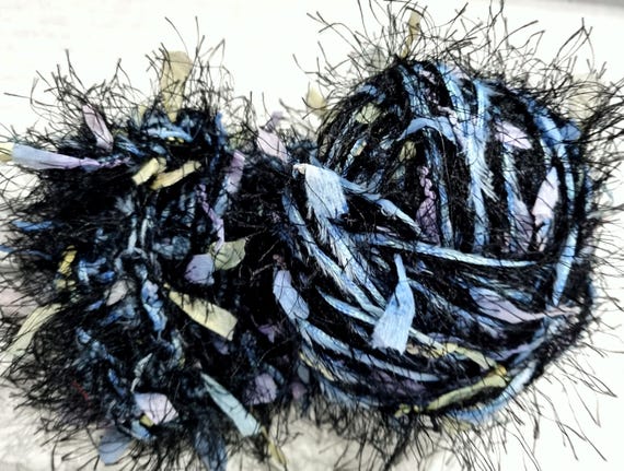 Wool, designer yarn mix, accent yarn/effect yarn/ Papyrus Live, black/pastel, light blue fringed ribbon, hand-wound, vintage wool