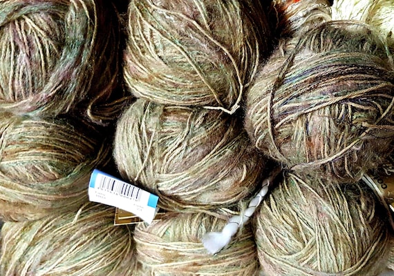 Wool, designer yarn mix, khaki tones with brown/blue/gold, hand-wound, approx. 800 g, various fiber types, needle size 5-6, vintage wool