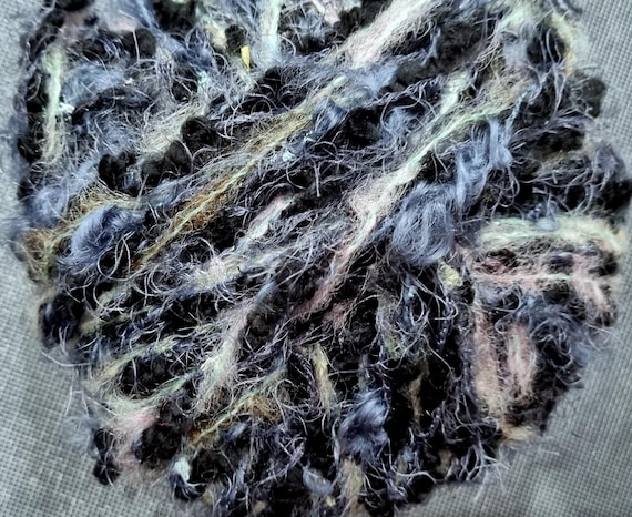 Wool, designer yarn mix, accent yarn/effect yarn/ extra soft, black with Kir Royal mint, approx. 240 grams, hand-wound, vintage wool