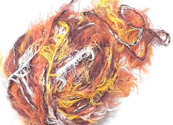 Wool, designer yarn mix, accent yarn/soft novelty yarn/orange tones/Lurex, description, various fiber types, hand-wound, vintage wool