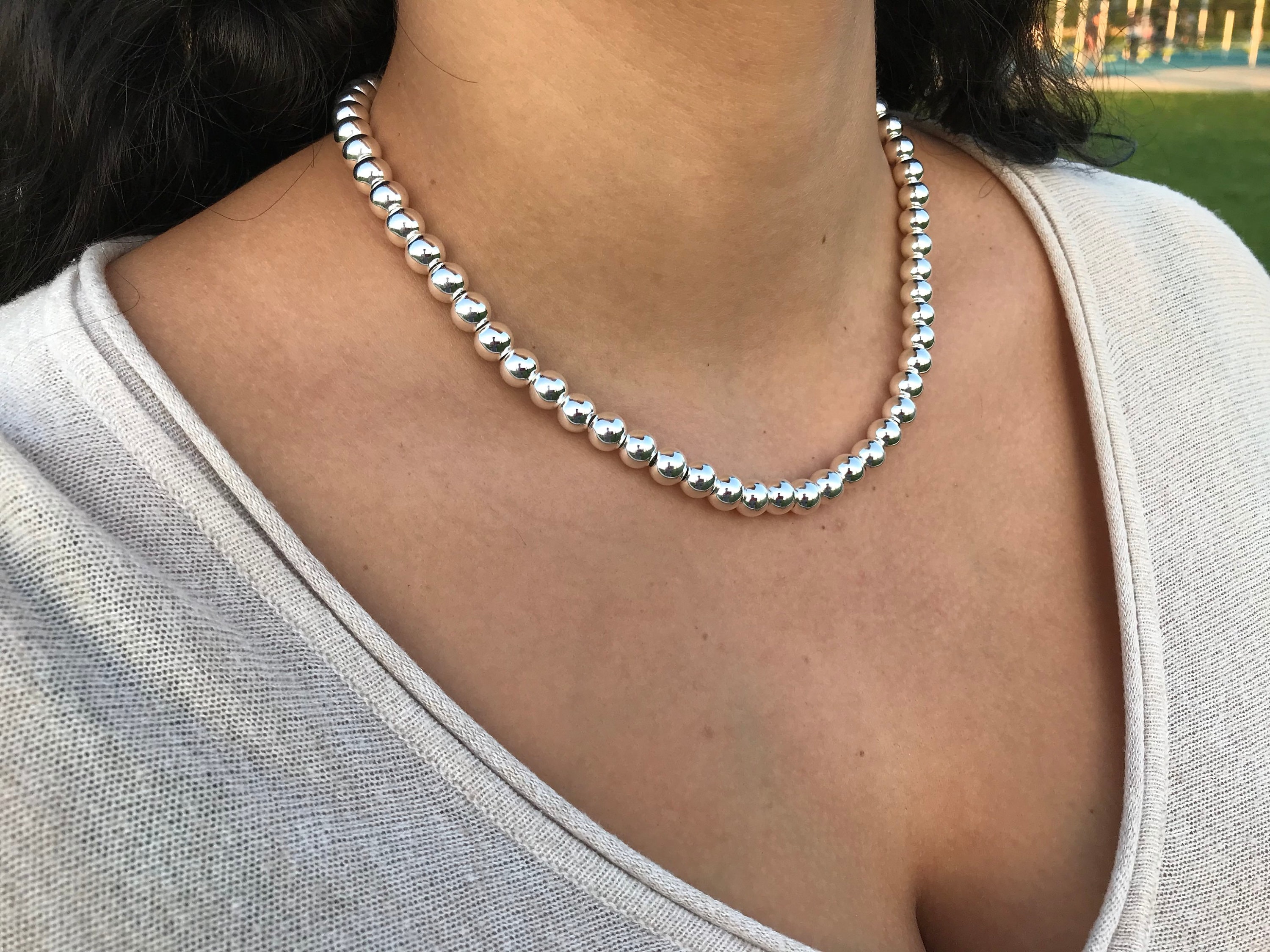 Tiffany and Co. Hardware Graduated Sterling Silver Ball Bead Necklace For  Sale at 1stDibs | tiffany graduated ball necklace, tiffany ball necklace,  tiffany silver ball necklace