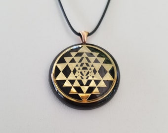 Orgonite® Pendant - Sri Yantra orgone amulet pendant with quartz crystal. Protection from  EMF / RF radiation of cell phone