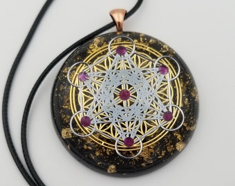 Orgonite® Pendant - Metatrons Flower of life orgone® amulet pendant with Rubies & quartz crystal. Protection from  EMF Protection