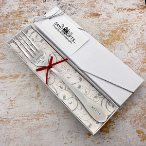 I forking love you - a fun hand stamped message on a stainless steel fork.  A perfect valentine’s gift or a fun 11th Anniversary gift